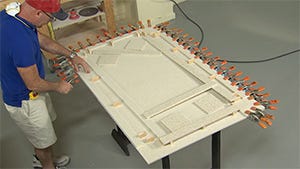 clamping the edge buildup all the way around every 1-2 inches