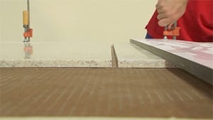 Clamping straight edge to keep cut line aligned