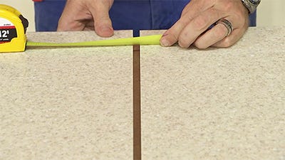 ensuring there is a consistent gap between the two pieces of solid surface