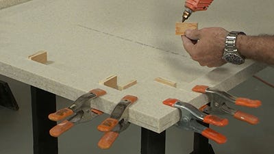 Gluing in stop blocks with hot glue gun