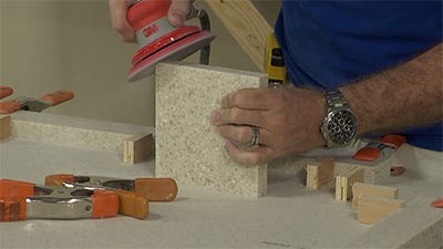 sanding the inside corner of the material
