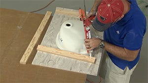 applying silicone to the substrate