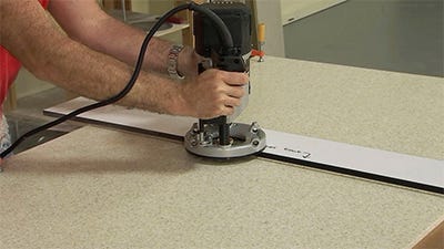 cutting solid surface with a template guide