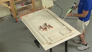 two part adhesive step to the seam area